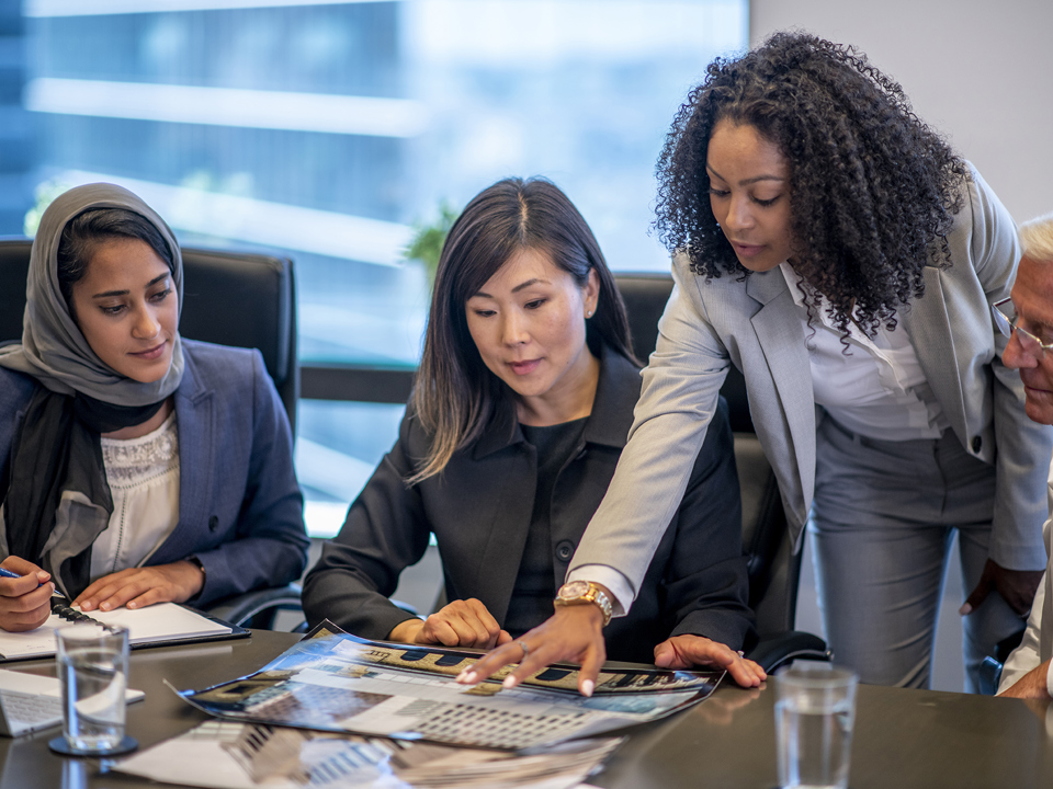 People together around a desk